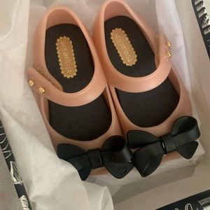 Mini Melissa pink and black bow shoes